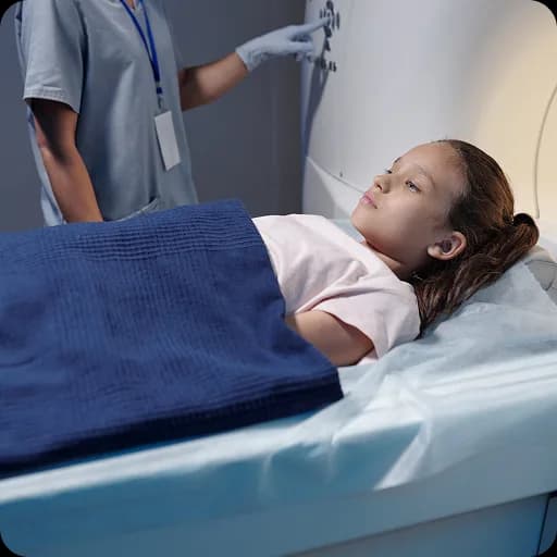 Teenager lying in a hospital bed