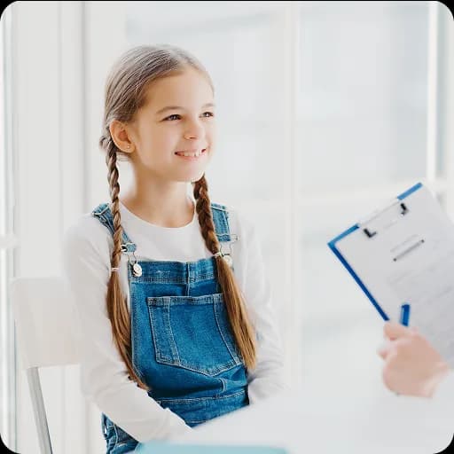 Girl with a doctor holding a clipboard