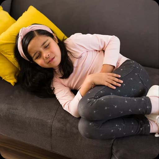 Teenage girl lying on a sofa