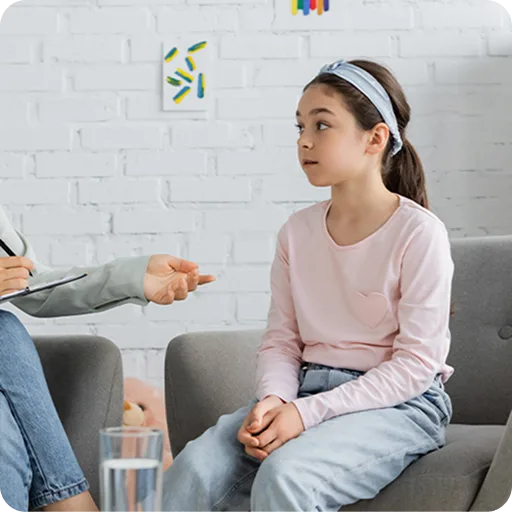 Teenage girl talking with a therapist