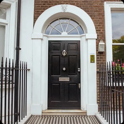 Black front door of a Georgian townhouse