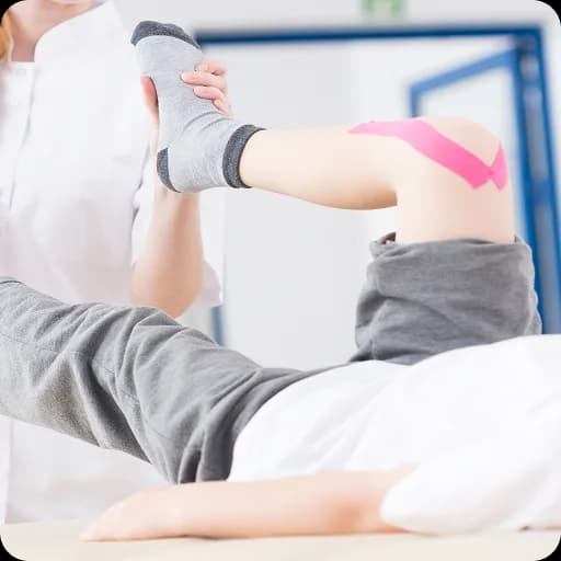 Physiotherapist working with a child's leg