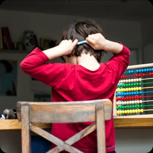 Child covering their ears
