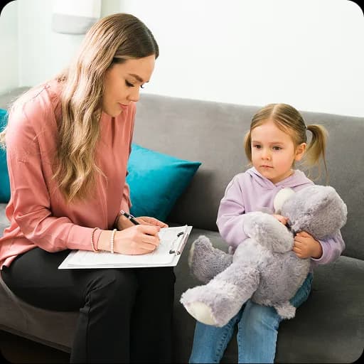 Toddler with a therapist
