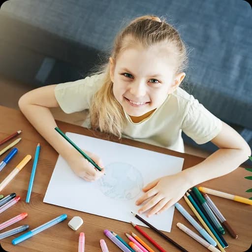Girl drawing with coloured pencils