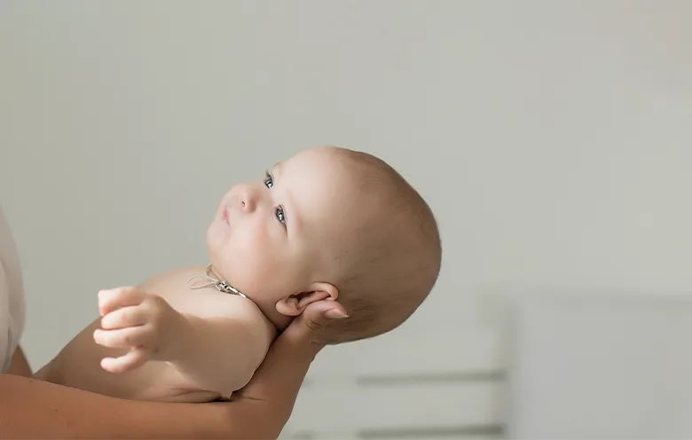 Baby lying on its back