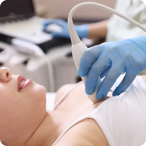 Doctor using an ultrasound probe on a baby