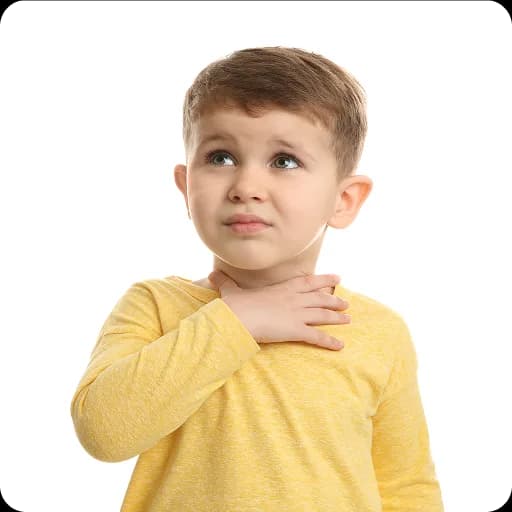 Young boy holding his chest