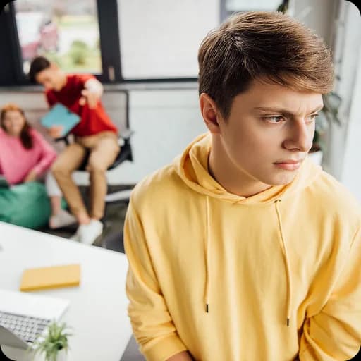 Teenage boy in a yellow hoodie