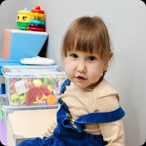 Toddler playing with toys