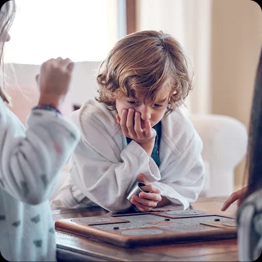 Child doing an assessment activity at a table