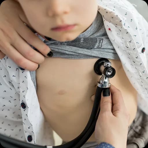 Doctor listening to a child's chest with a stethoscope