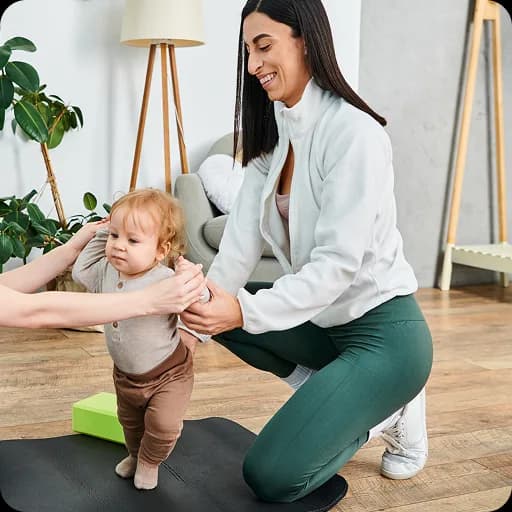 Physiotherapist working with a toddler
