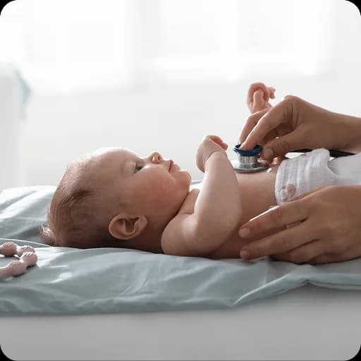 Doctor examining a newborn baby