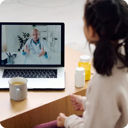 Laptop showing a video consultation