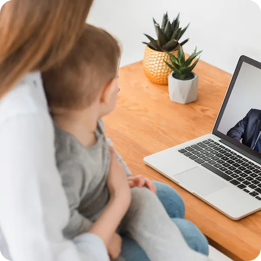 Mother and child on a laptop video call