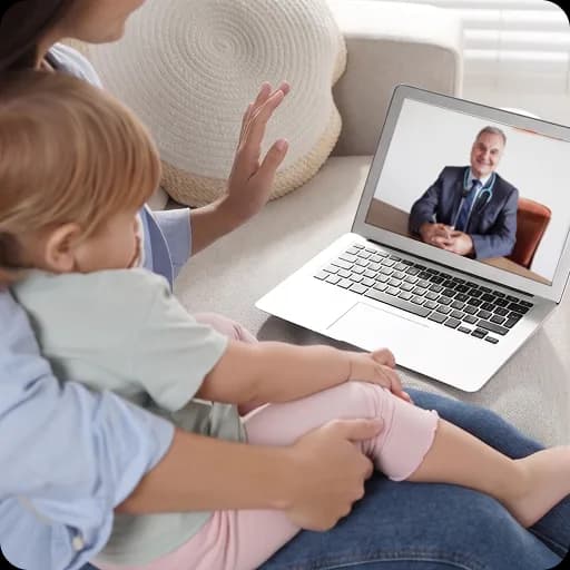 Mother and child on a video consultation with a doctor