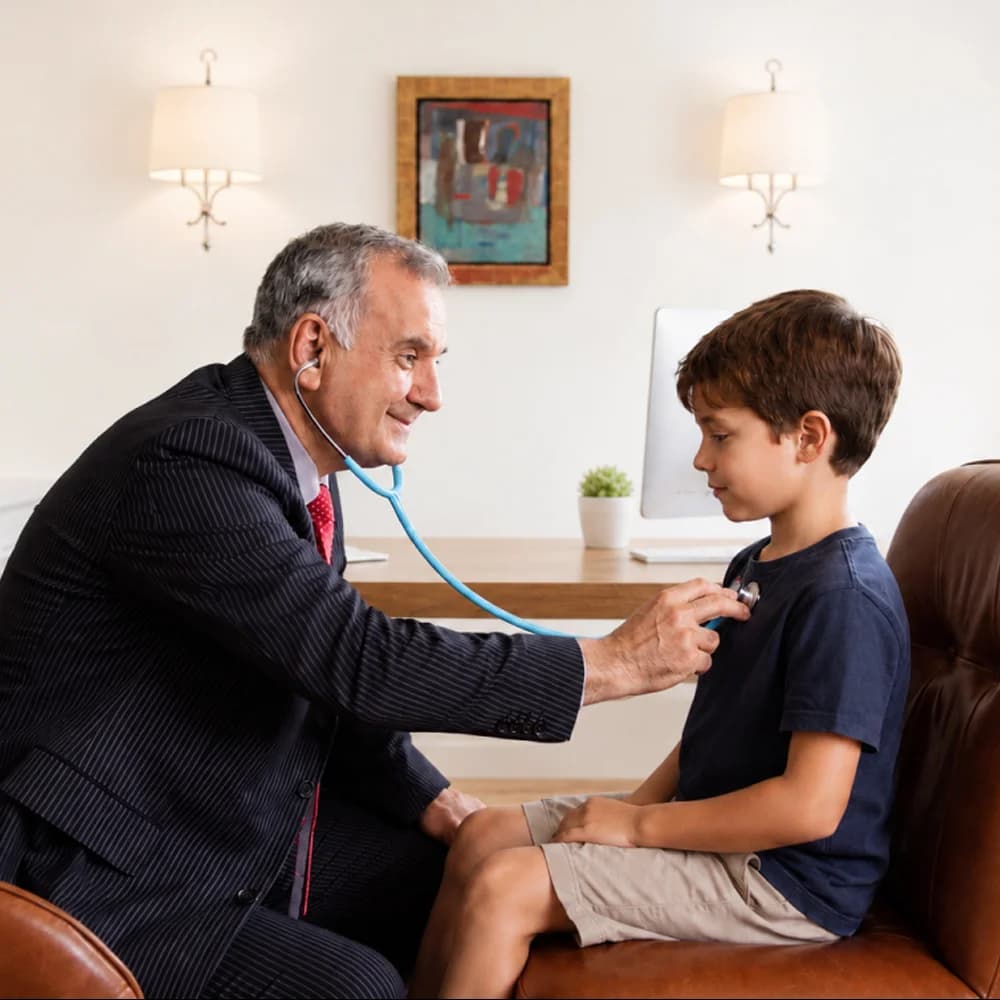 Dr Badr Chaban examining a young patient
