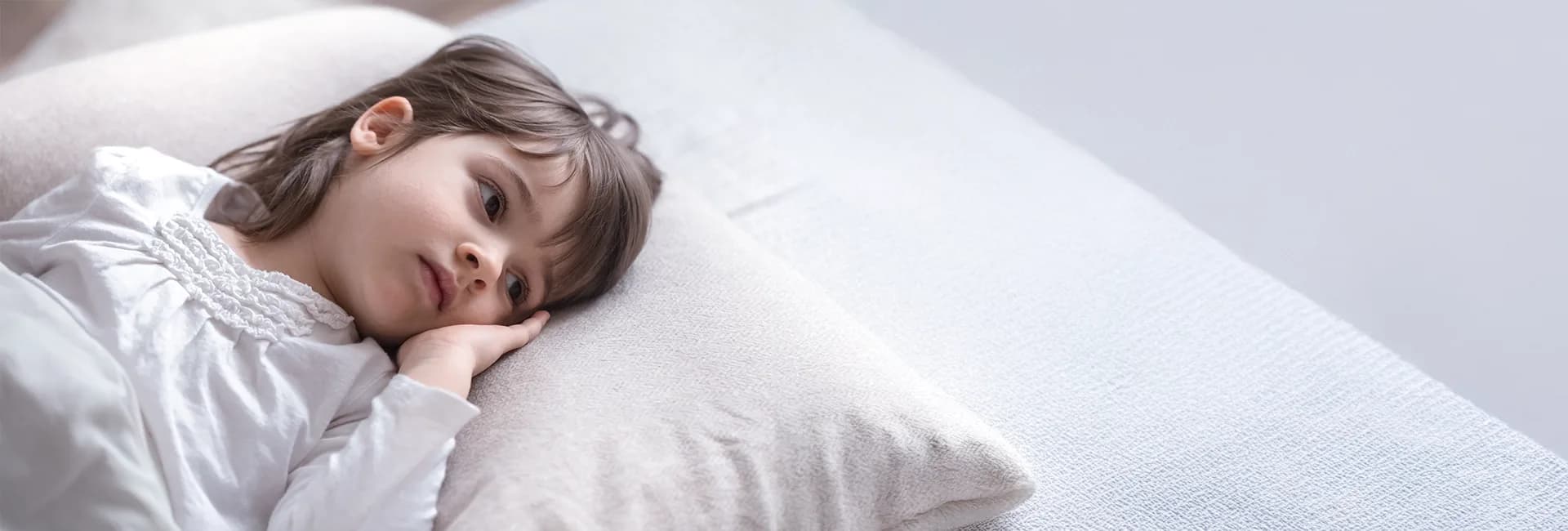 Girl lying in bed
