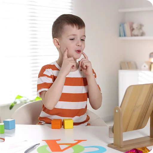 Boy playing at a table