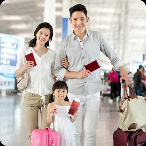 Family with suitcases at an airport